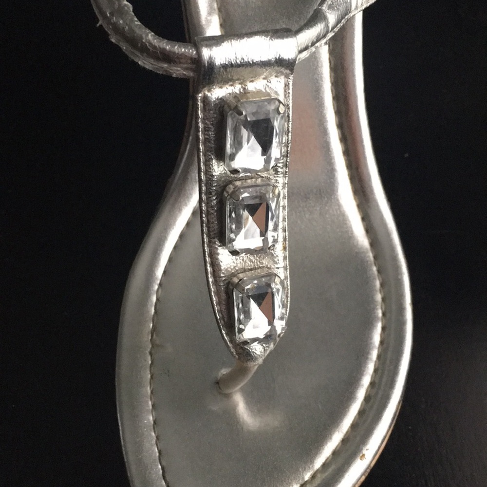 Silver wedge sandals.